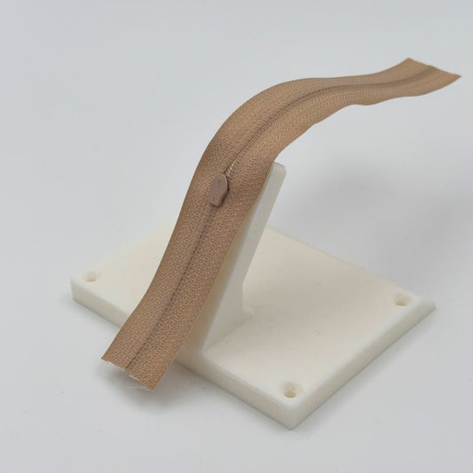 Glidelåsverktøy - til å feste glidere på glidelås i metervare