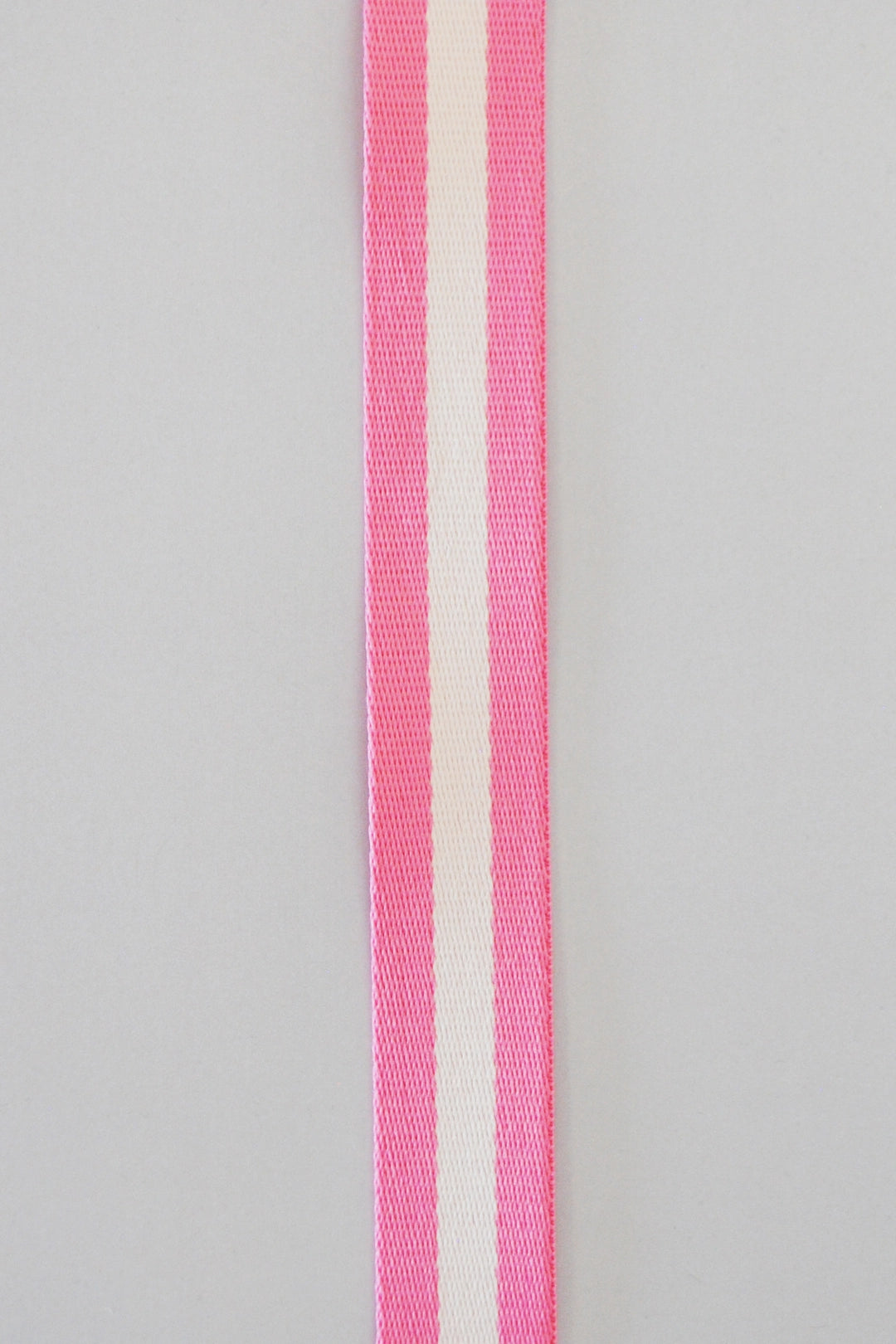 Gjordebånd (webbing) polyester 30 mm rosa/hvit (pris pr dm)