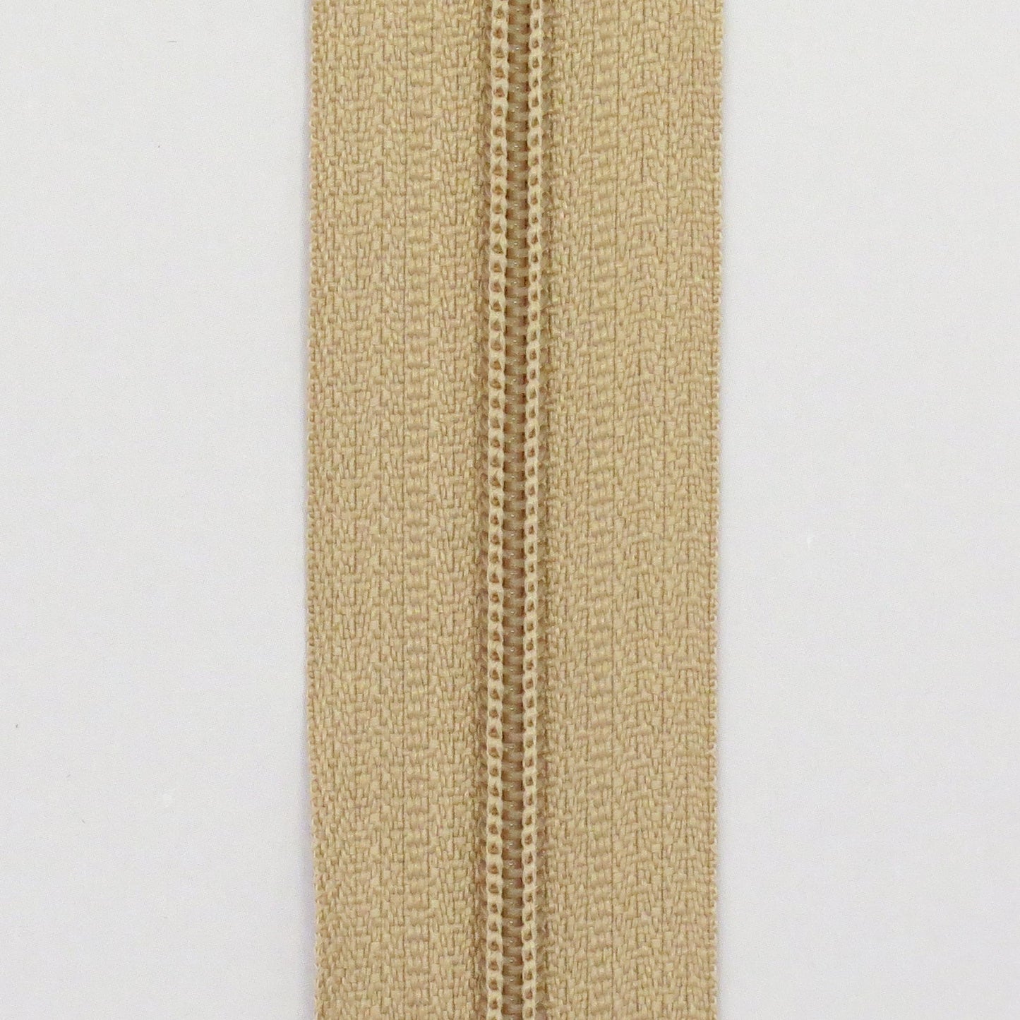 Glidelås metervare 4mm Spiral - Beige (Pris oppgitt pr dm)