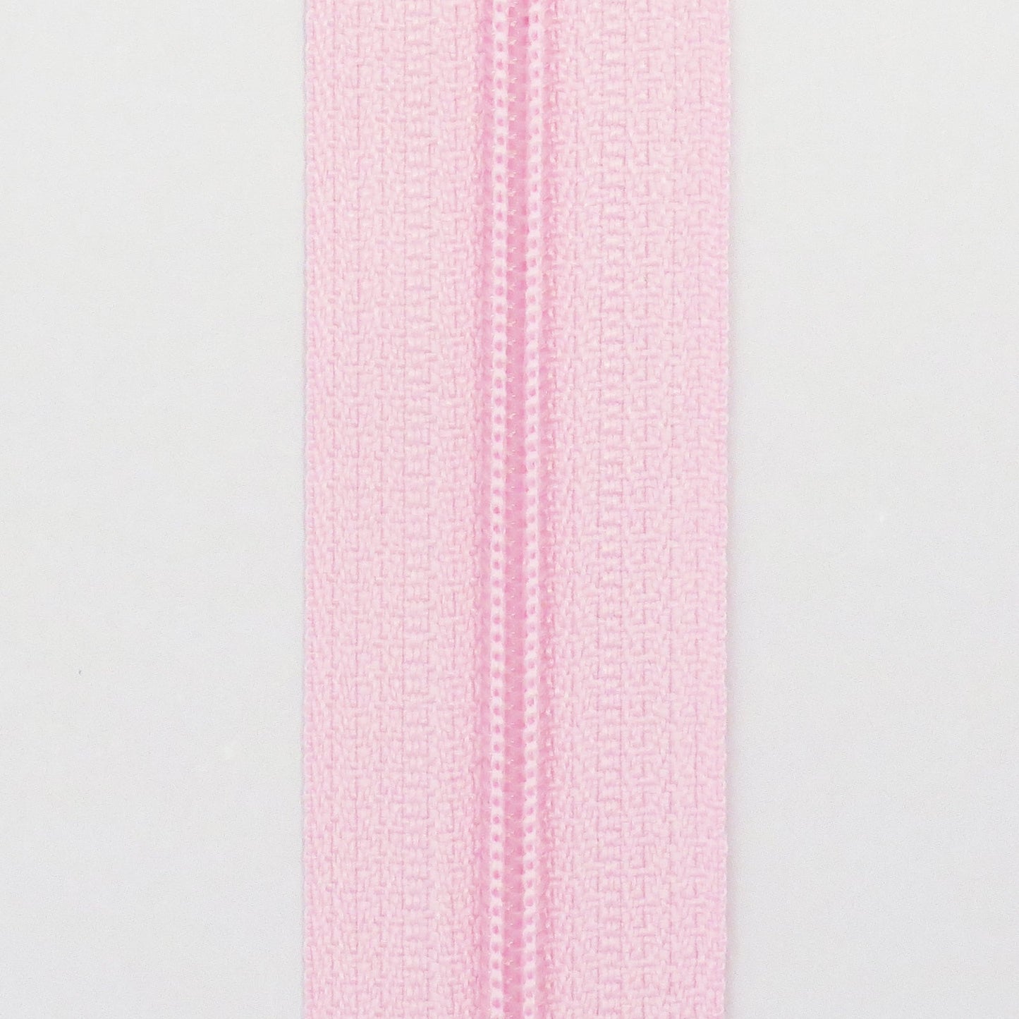 Glidelås metervare 4mm Spiral - Rosa (Pris oppgitt pr dm)