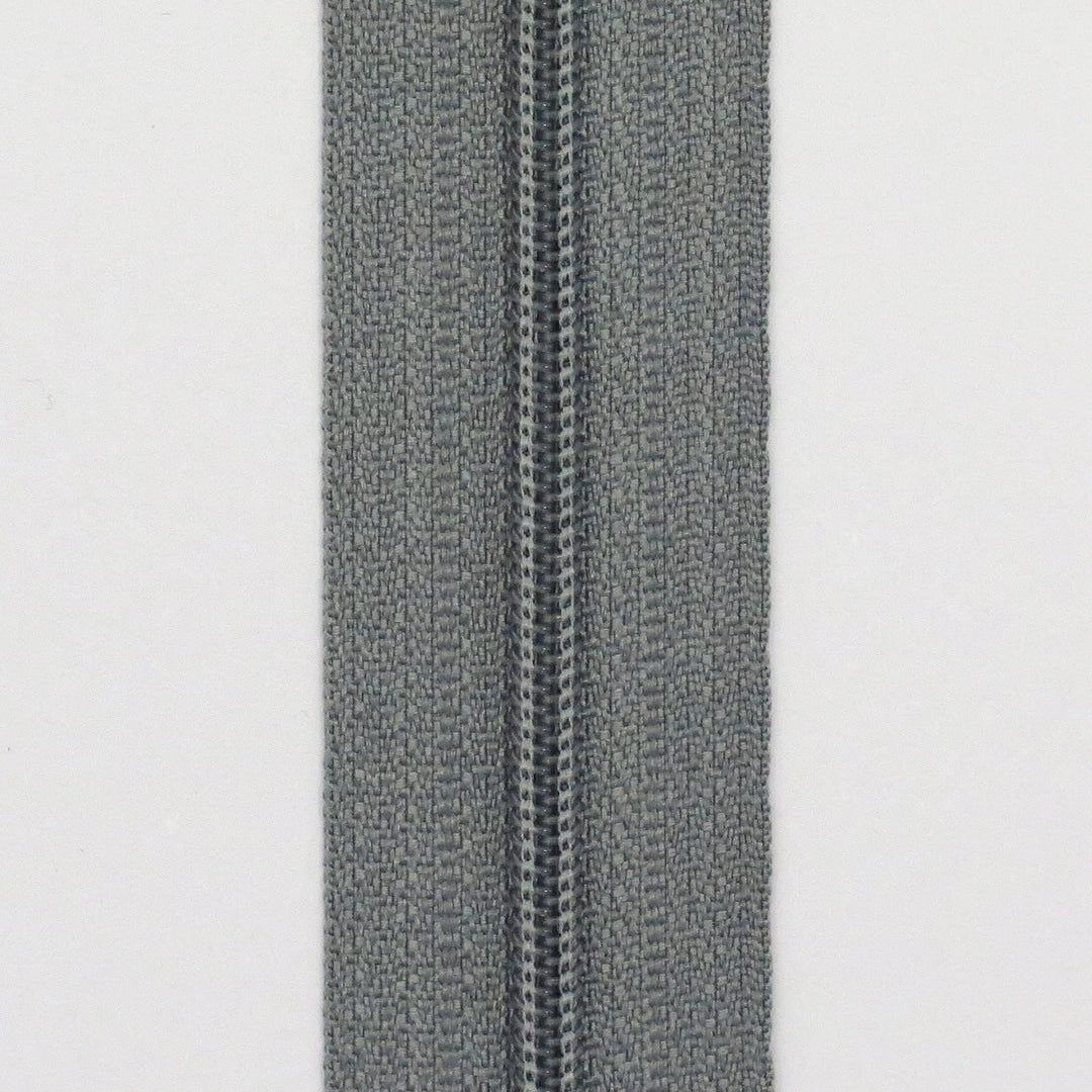 Glidelås metervare 4mm Spiral - Grå (Pris oppgitt pr dm)