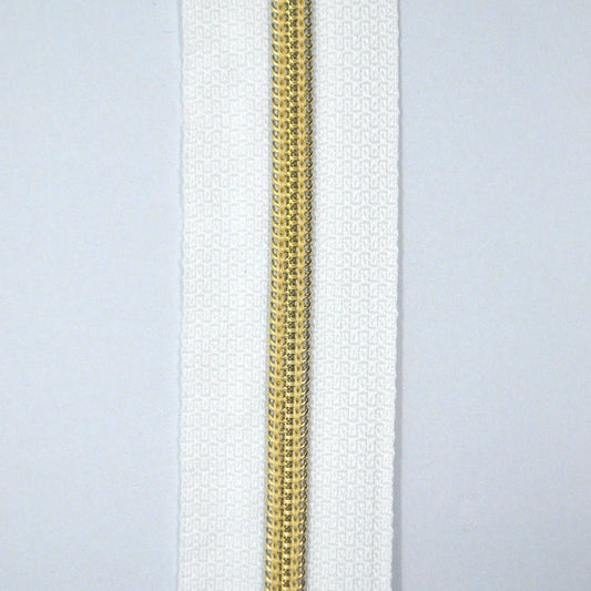 Glidelås metervare 6mm Spiral -  Metalllook Gull/Hvit (Pris oppgitt pr dm)