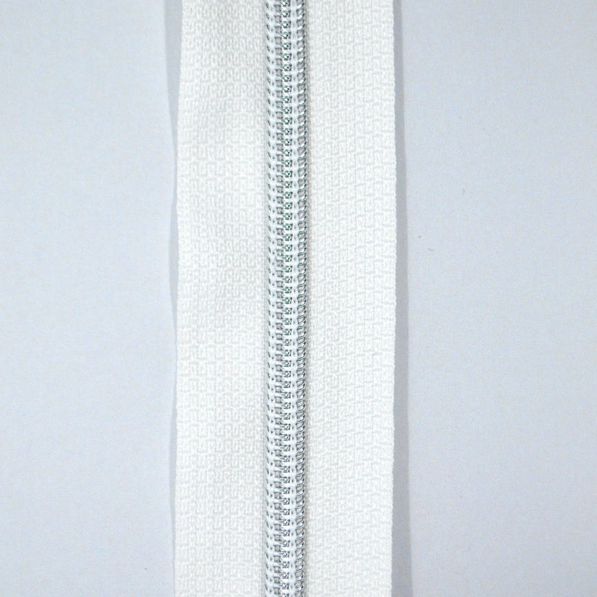 Glidelås metervare 6mm Spiral -  Metalllook Sølv/Hvit (Pris oppgitt pr dm)