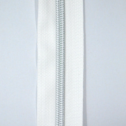 Glidelås metervare 6mm Spiral -  Metalllook Sølv/Hvit (Pris oppgitt pr dm)